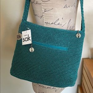 The Sak teal cross body